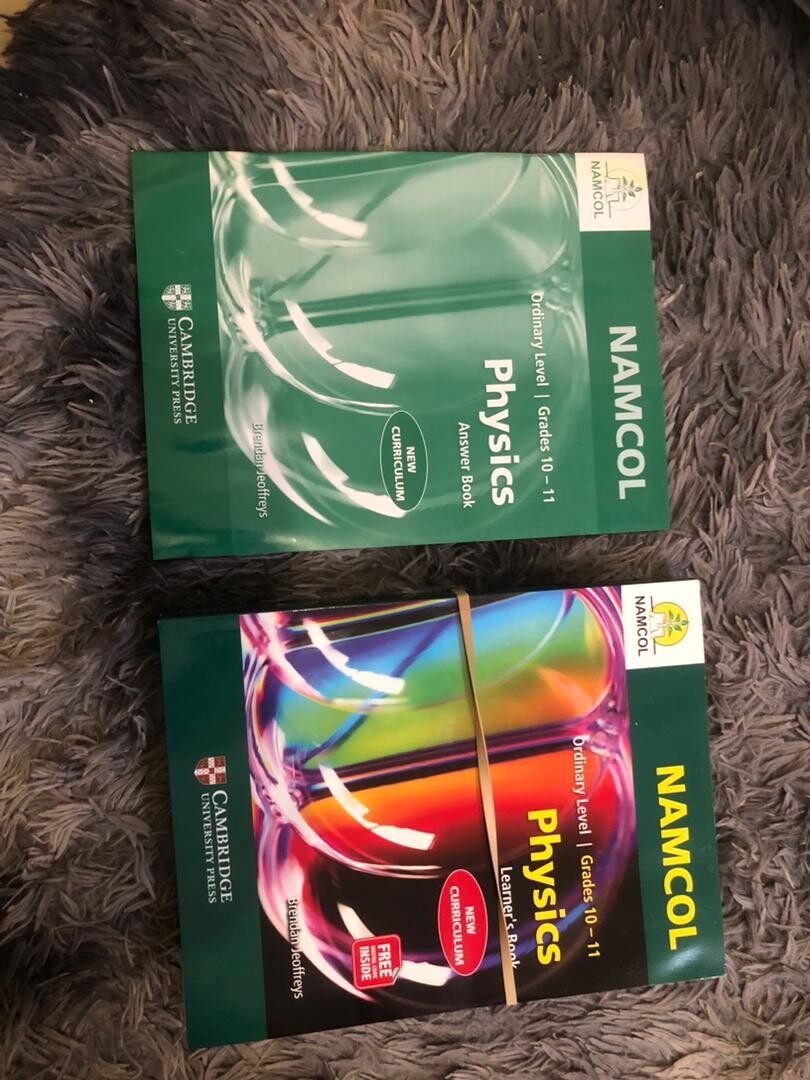 NSSCO Physics Text Book +answer book photo 1