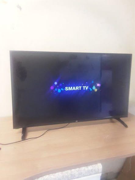 Jvc smart tv with remote control photo 1