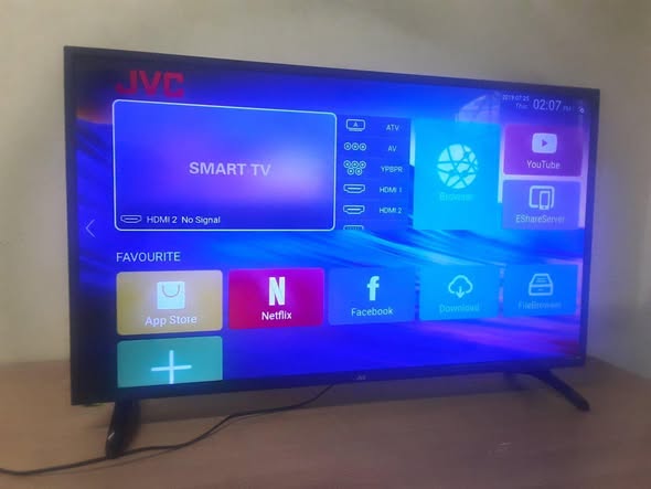 Jvc smart tv with remote control photo 3