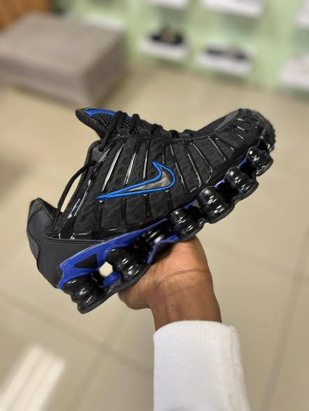 Black and blue Nike photo 2