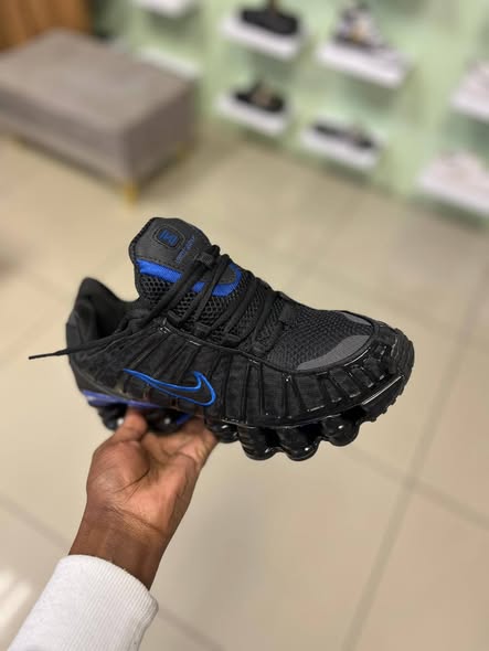 Black and blue Nike photo 3