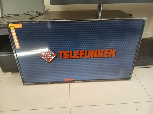Telefunken 40inch normal TV with remote photo 1
