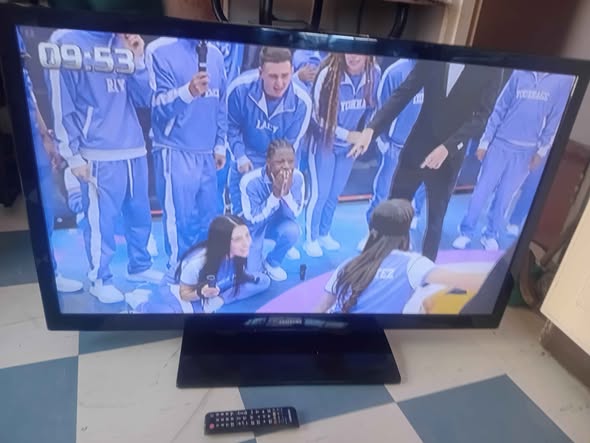 Samsung 49 inch TV with remote photo 1