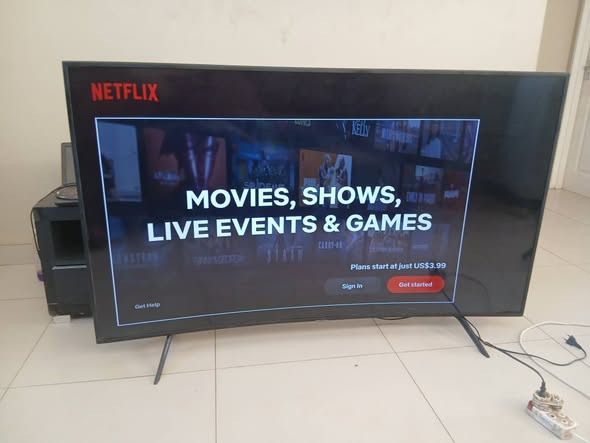 Samsung 65inch cuver smart Tv with remote photo 3