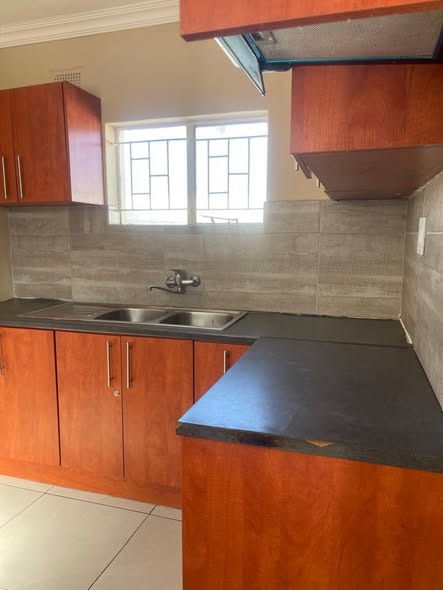 2 BEDROOM BACKYARD FLAT FOR RENT photo 1
