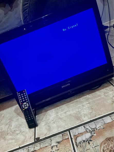 Deluxe 25 inch Tv photo 3