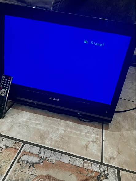 Deluxe 25 inch Tv photo 1
