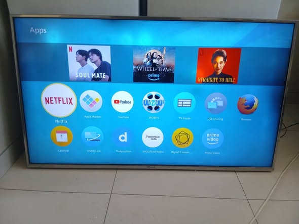 Panasonic 55inch smart Tv with remote photo 2